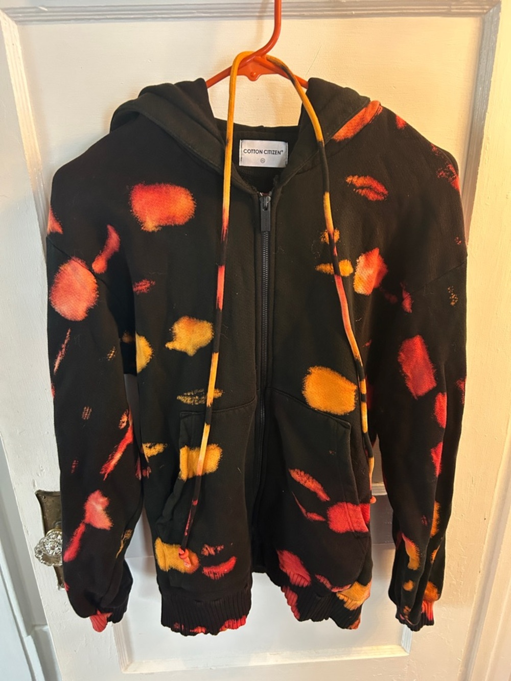 Cotton Citizen Black Zip Hoodie with Red & Yellow Tie-Dye Spots